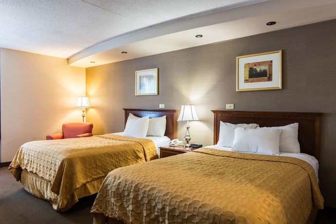 Imagen de la habitación del Hotel The Plaza Inn and Suites. Foto 6