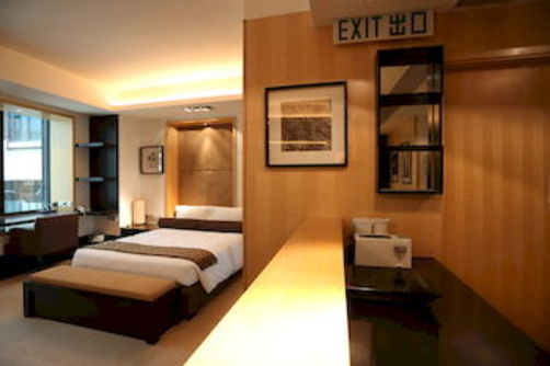 Imagen de la habitación del Hotel The Plaza Lan Kwai Fong. Foto 2