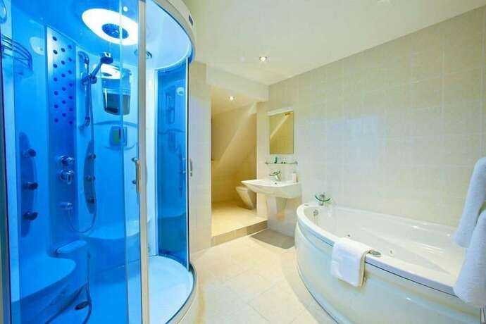 Imagen de la habitación del Hotel The Poachers Country. Foto 17