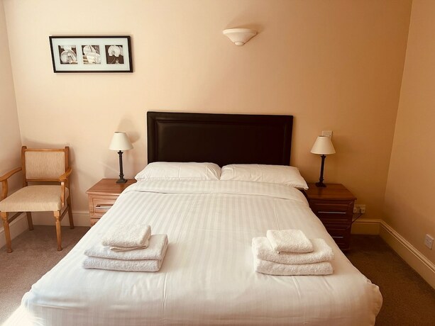 Imagen de la habitación del Hotel The Poachers Country. Foto 18