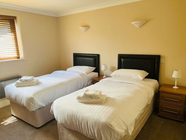 Imagen de la habitación del Hotel The Poachers Country. Foto 19