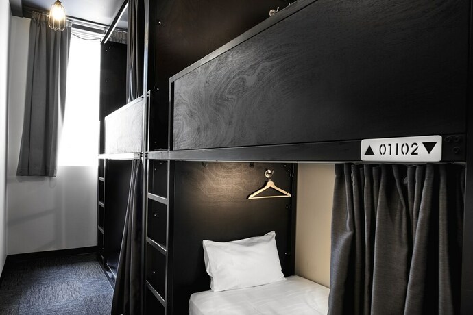 Imagen de la habitación del Hotel The Pod Sydney. Foto 18