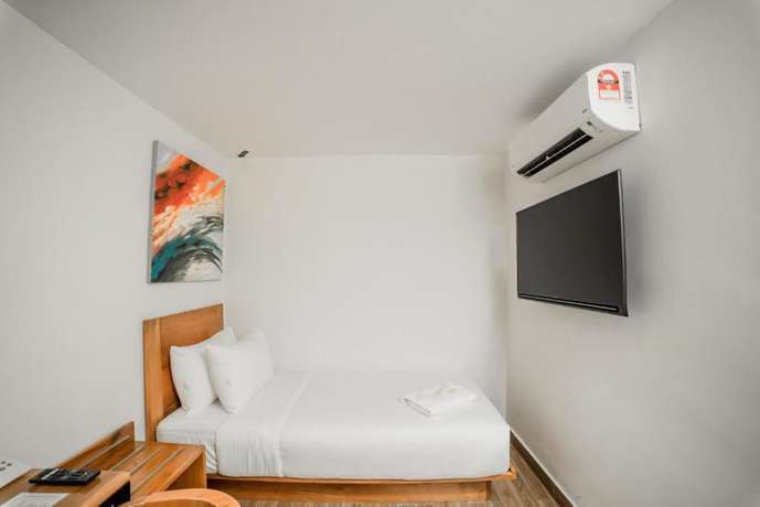 Imagen de la habitación del Hotel The Point Boutique. Foto 2