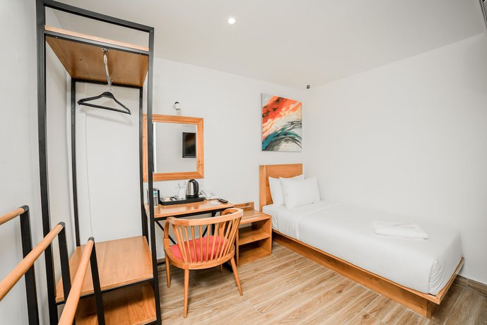 Imagen de la habitación del Hotel The Point Boutique. Foto 7