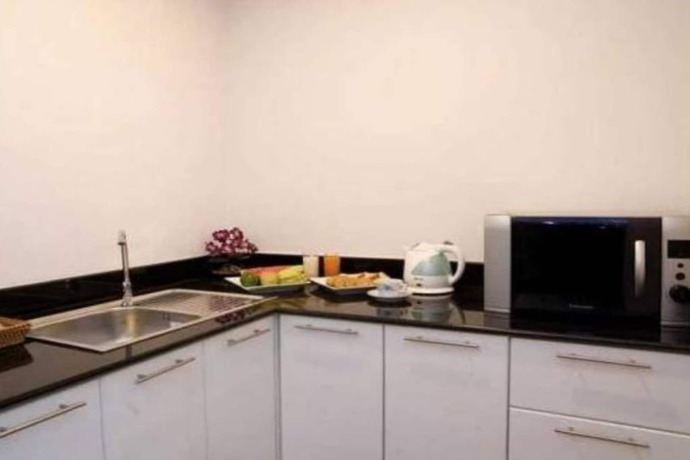 Imagen de la habitación del Hotel The Point Residence. Foto 6