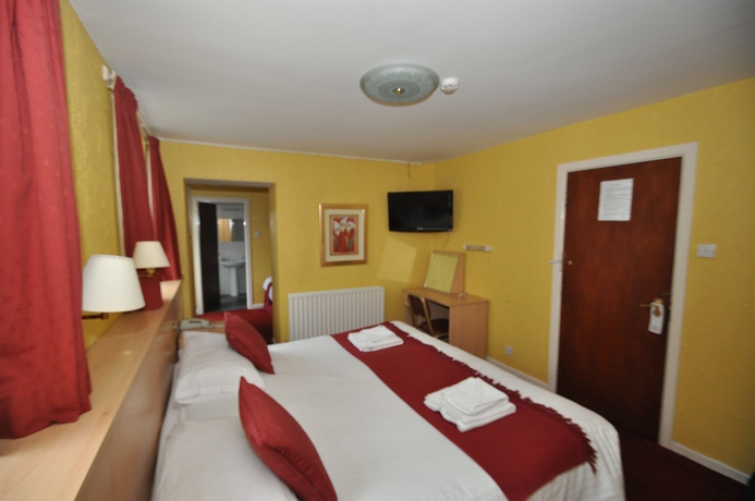 Imagen de la habitación del Hotel The Port. Foto 5