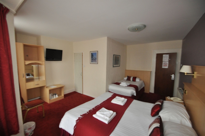 Imagen de la habitación del Hotel The Port. Foto 8