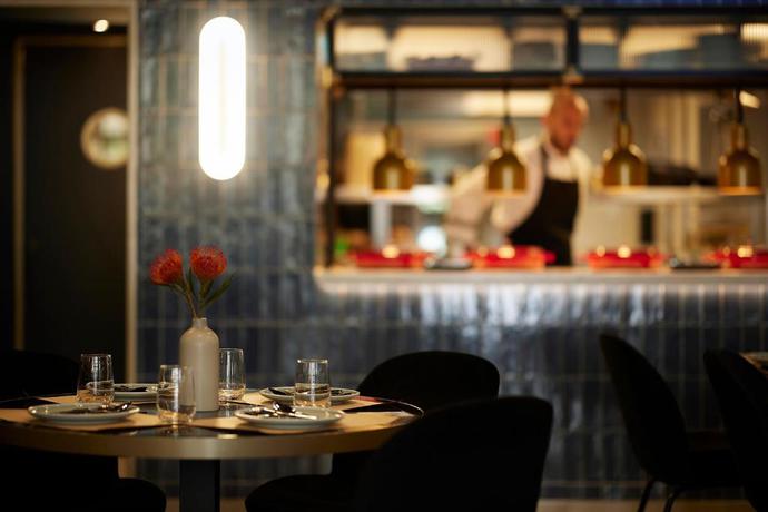 Imagen del bar/restaurante del Hotel The Port Square. Foto 6