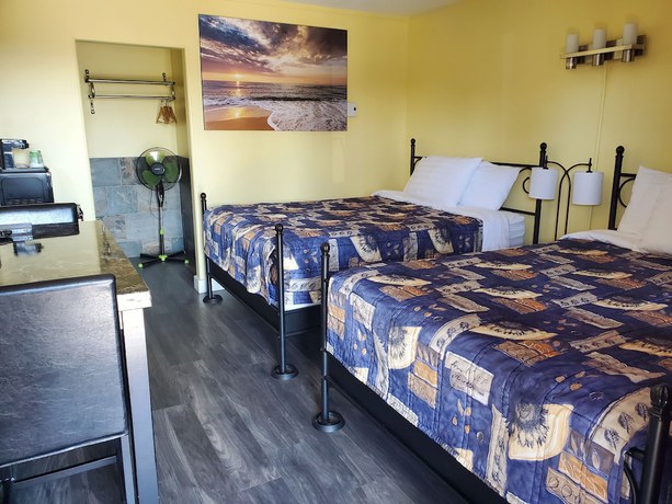 Imagen de la habitación del Hotel The Port-O-Call Inn and Suites. Foto 11