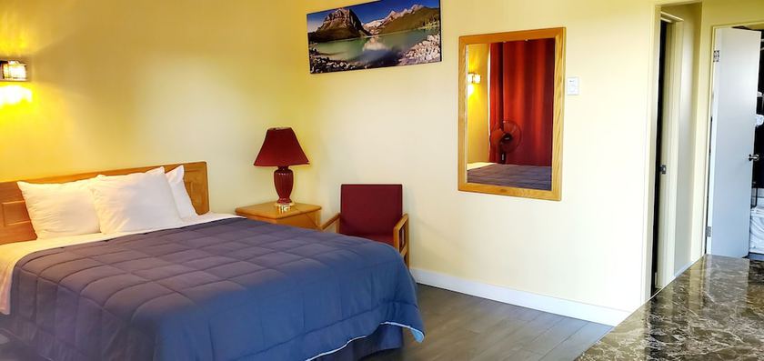 Imagen de la habitación del Hotel The Port-O-Call Inn and Suites. Foto 13