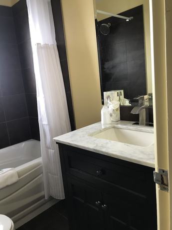 Imagen de la habitación del Hotel The Port-O-Call Inn and Suites. Foto 14