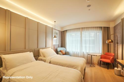 Imagen de la habitación del Hotel The Porter House Sydney - Mgallery. Foto 12