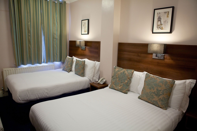 Imagen de la habitación del Hotel The Portico. Foto 6