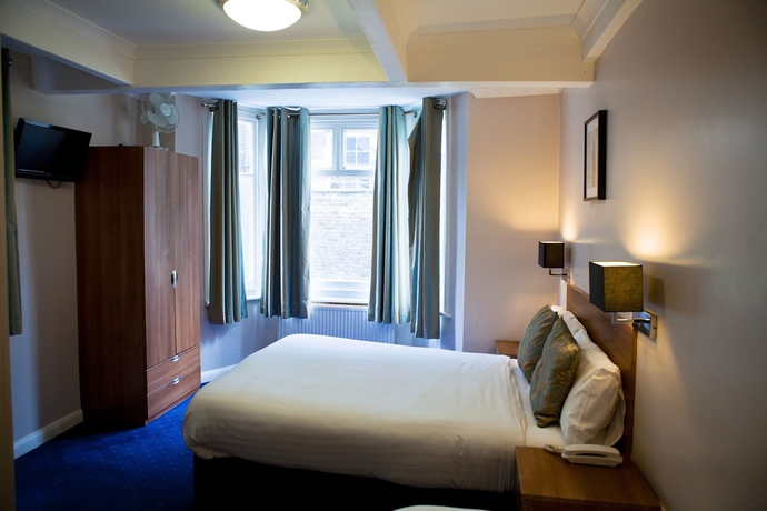 Imagen de la habitación del Hotel The Portico. Foto 7