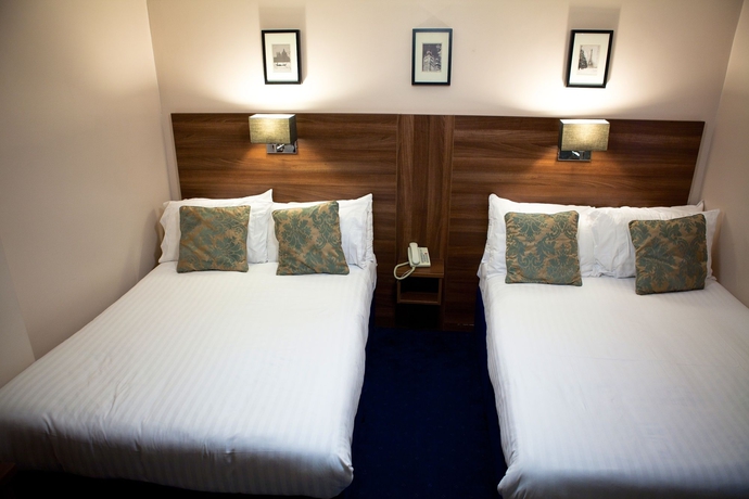 Imagen de la habitación del Hotel The Portico. Foto 8