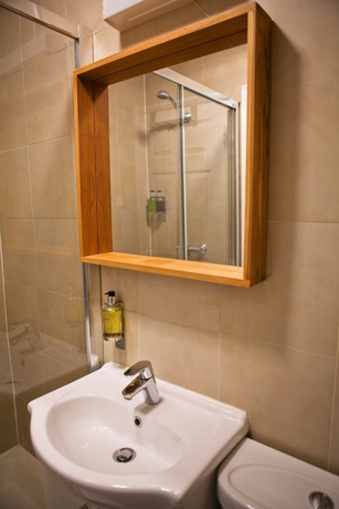 Imagen de la habitación del Hotel The Portico. Foto 12