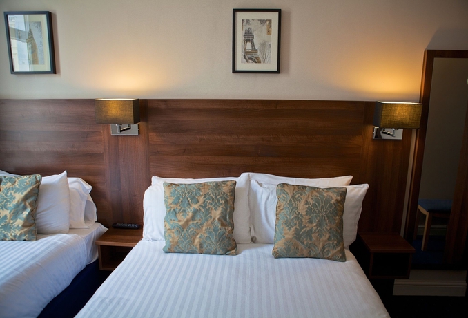 Imagen de la habitación del Hotel The Portico. Foto 15