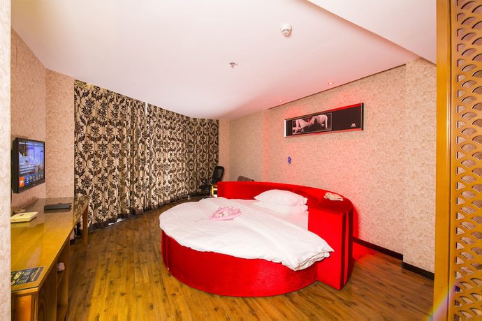 Imagen de la habitación del Hotel The Posh Hotel. Foto 12