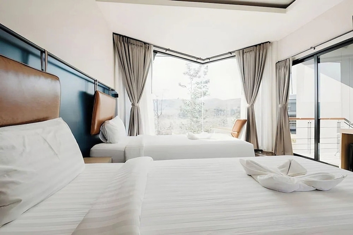 Imagen de la habitación del Hotel The Posh Khao Kho. Foto 11