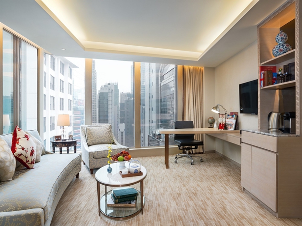 Imagen de la habitación del Hotel The Pottinger Hong Kong. Foto 6