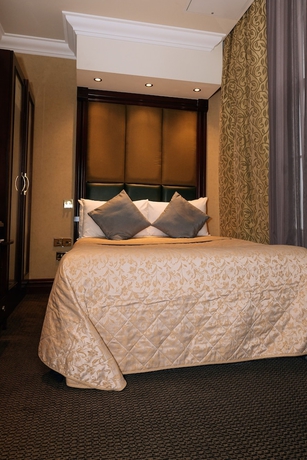 Imagen de la habitación del Hotel The Premier Notting Hill. Foto 3