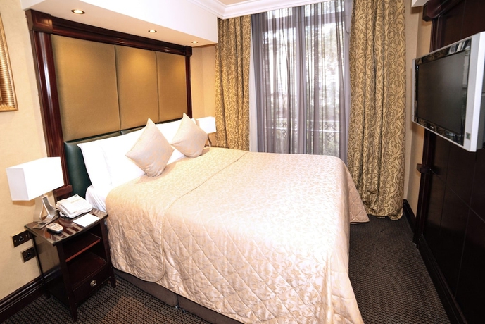 Imagen de la habitación del Hotel The Premier Notting Hill. Foto 9