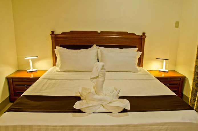 Imagen de la habitación del Hotel The Premiere Business. Foto 7