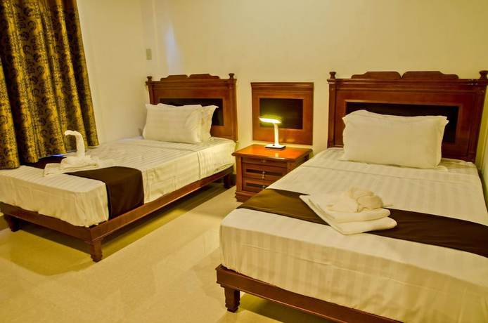 Imagen de la habitación del Hotel The Premiere Business. Foto 10