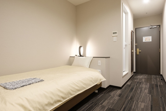 Imagen de la habitación del Hotel The Premium In Rinku. Foto 2