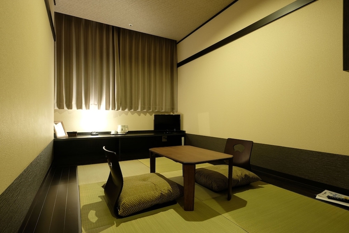 Imagen de la habitación del Hotel The Premium In Rinku. Foto 7