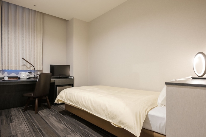 Imagen de la habitación del Hotel The Premium In Rinku. Foto 12