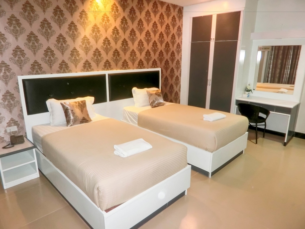 Imagen de la habitación del Hotel The Premium Residence. Foto 7