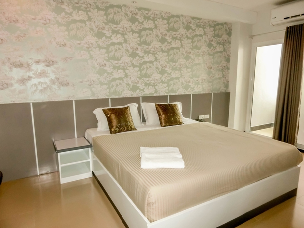 Imagen de la habitación del Hotel The Premium Residence. Foto 9