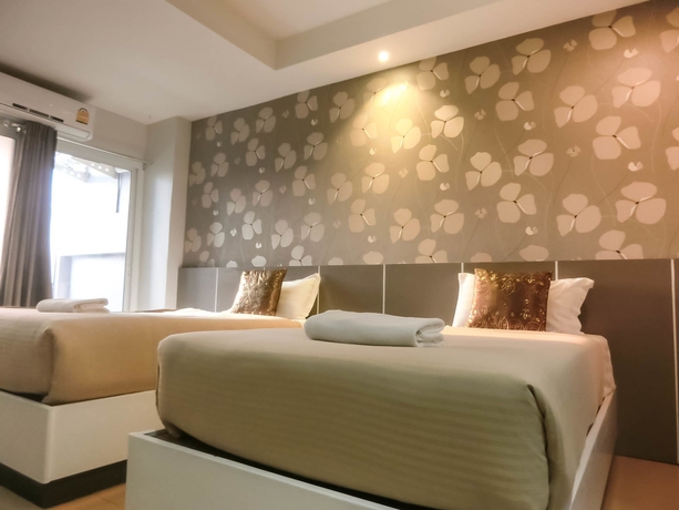 Imagen de la habitación del Hotel The Premium Residence. Foto 15