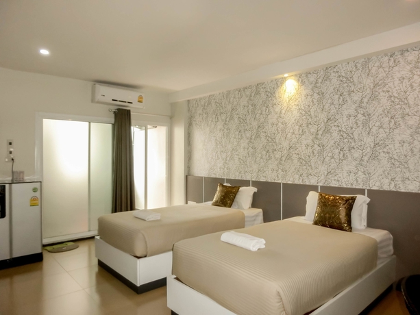 Imagen de la habitación del Hotel The Premium Residence. Foto 17