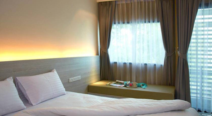 Imagen de la habitación del Hotel The Present Sathorn. Foto 3