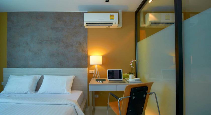 Imagen de la habitación del Hotel The Present Sathorn. Foto 5