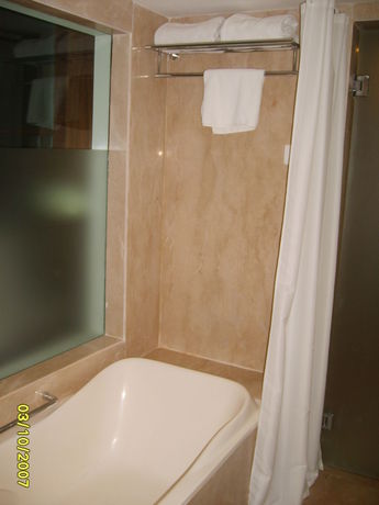 Imagen de la habitación del Hotel The Pride Chennai. Foto 6