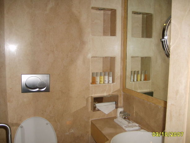 Imagen de la habitación del Hotel The Pride Chennai. Foto 8