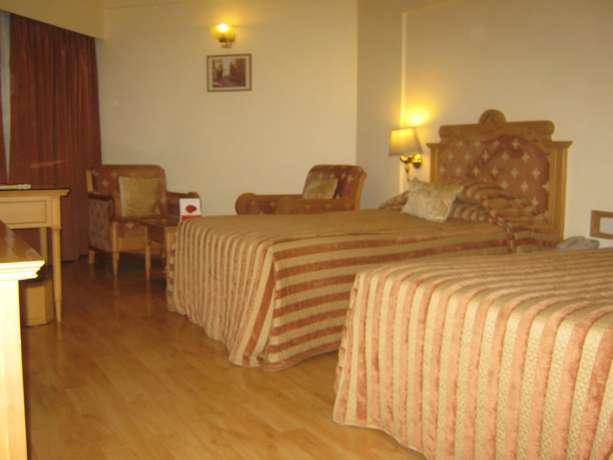 Imagen de la habitación del Hotel The Pride Nagpur. Foto 2