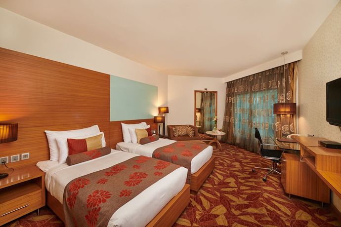 Imagen de la habitación del Hotel The Pride Nagpur. Foto 3