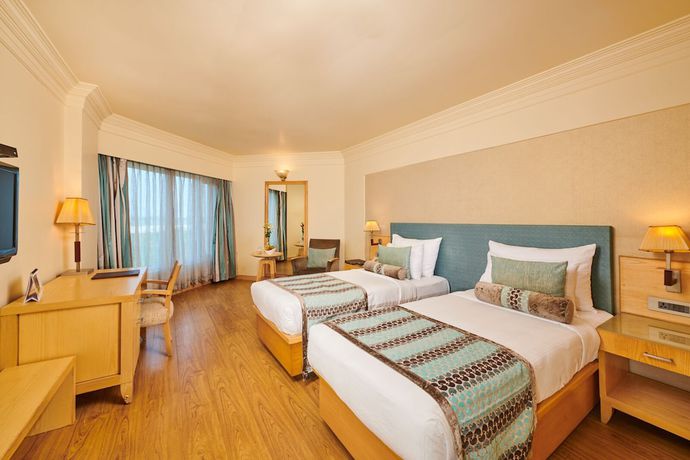 Imagen de la habitación del Hotel The Pride Nagpur. Foto 11
