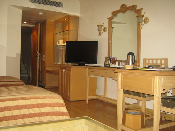 Imagen de la habitación del Hotel The Pride Nagpur. Foto 16