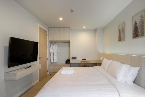 Imagen de la habitación del Hotel The Pride Phitsanulok. Foto 17