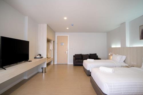 Imagen de la habitación del Hotel The Pride Phitsanulok. Foto 18