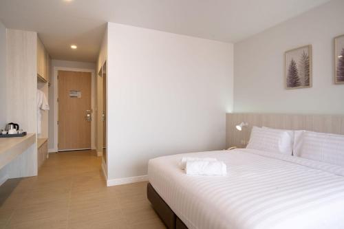 Imagen de la habitación del Hotel The Pride Phitsanulok. Foto 20