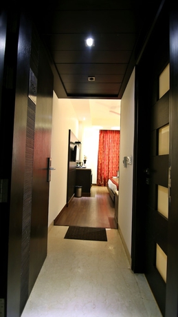 Imagen de la habitación del Hotel The Prime Balaji Deluxe @ New Delhi Railway Station. Foto 3