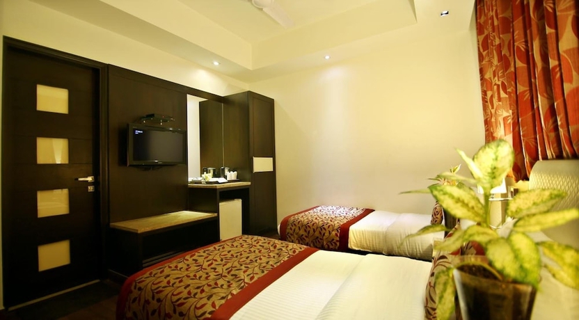 Imagen de la habitación del Hotel The Prime Balaji Deluxe @ New Delhi Railway Station. Foto 5