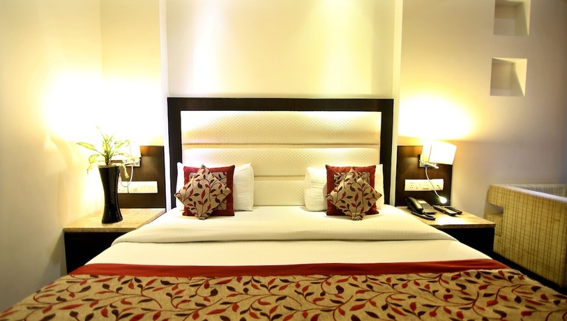 Imagen de la habitación del Hotel The Prime Balaji Deluxe @ New Delhi Railway Station. Foto 9