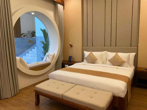 Imagen de la habitación del Hotel The Prime Canggu Bali. Foto 19